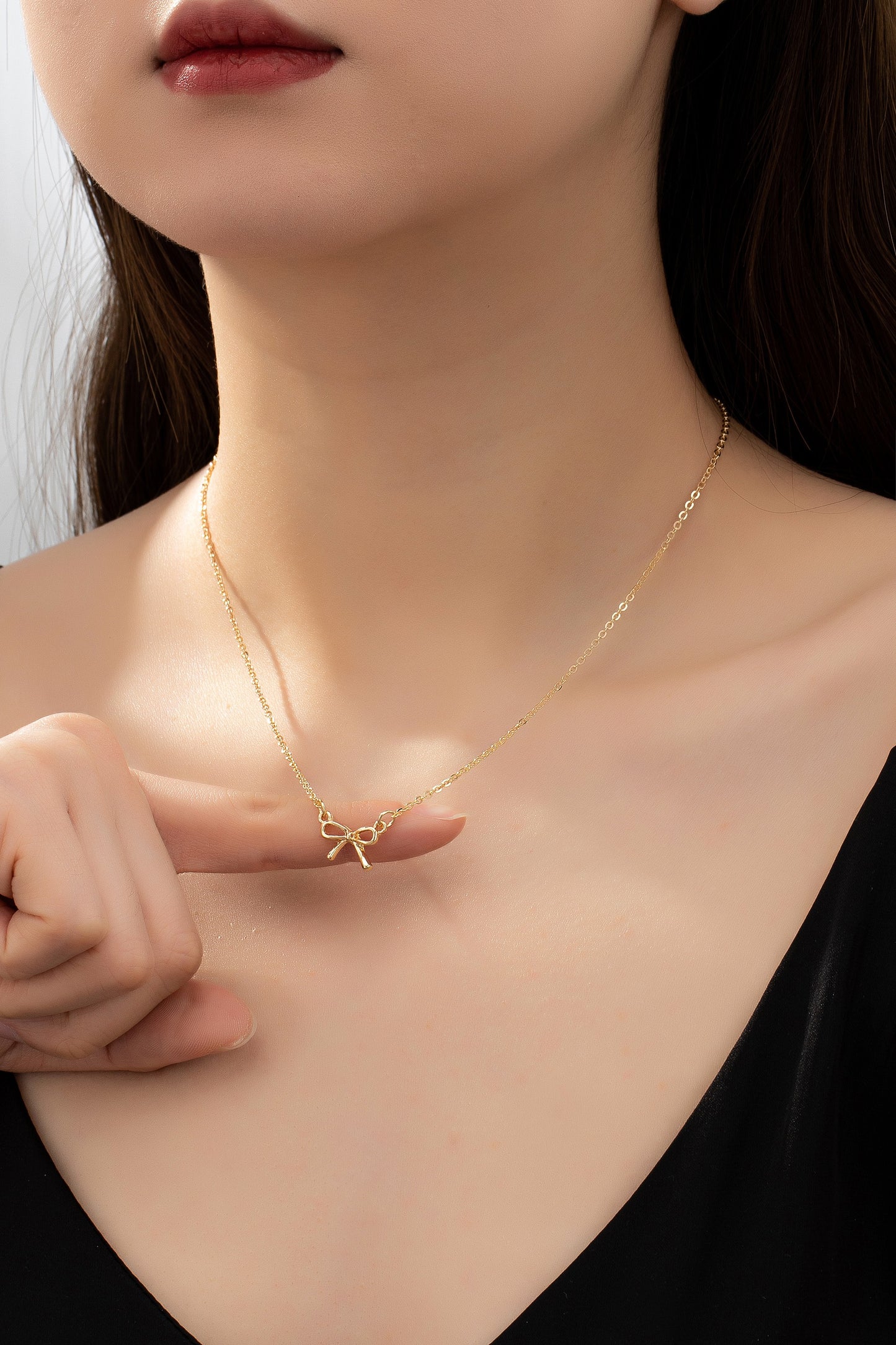 Gold Delicate Bow Necklace